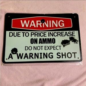 Funny Metal No Trespassing Sign with predrilled holes for hanging